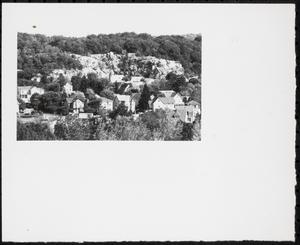 Rock outcroppings above houses