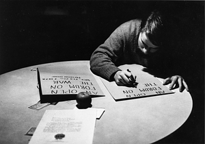 Sign making to oppose the war in Vietnam, 1970